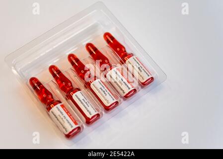 Hydroxocobalamin acetate ampoules, vitamin B12a. Red coloured solution for injection in the treatment for vitamin B12 deficiency. Accord Healthcare Stock Photo