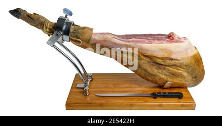 Cut of acorn-fed Iberian ham on metal and wood ham holder, typical Spanish gourmet delicacy Stock Photo