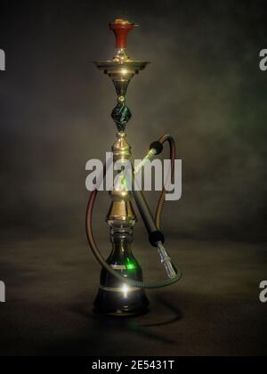 3D rendering of traditional Turkish tobacco water pipe on dark background Stock Photo