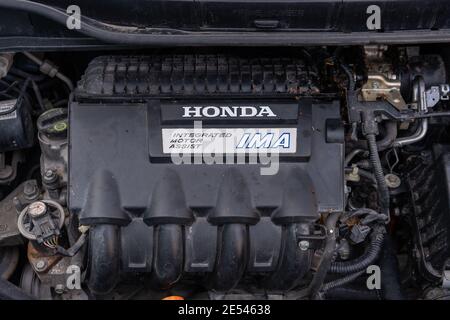 Honda IMA engine system in a used hybrid car Stock Photo