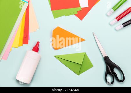 How to make Origami paper bookmark form of carrot for Easter greetings. Children's art project. DIY concept. Step by step photo instruction. Step 3 Stock Photo