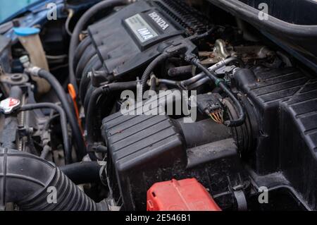 Honda IMA engine system in a used hybrid car Stock Photo