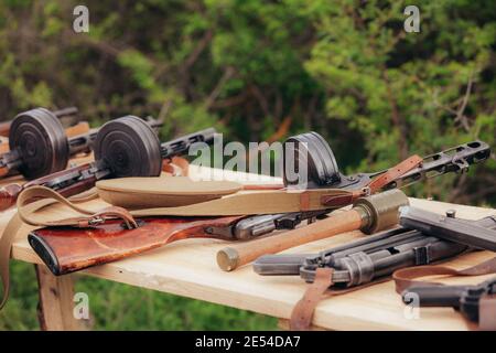 Shpugin's pistol gun lies on the table during the reconstruction of World War II in May. High quality photo Stock Photo