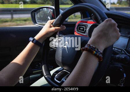 Woman driving Citroen C3 car Stock Photo