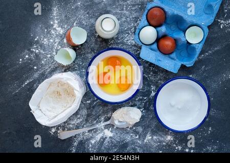 Basic batter ingredients on a slate background Stock Photo