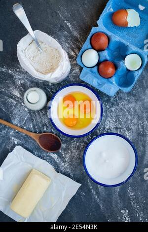 Basic batter ingredients on a slate background Stock Photo