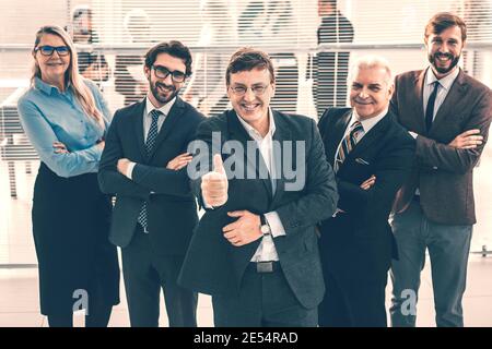 happy business man giving a thumbs up. Stock Photo