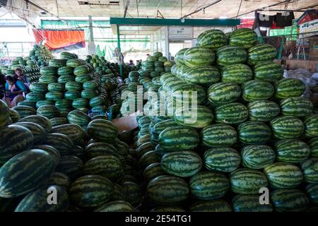 Stacks of watermelons for sale in the Thri Mingalar Market, Yangon, Myanmar. Stock Photo