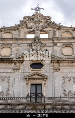Facade of Saint Lucy Church (Chiesa di Santa Lucia alla Badia) at Cathedral Square (Piazza del Duomo) on Ortygia island, Syracuse, Sicily, Italy Stock Photo