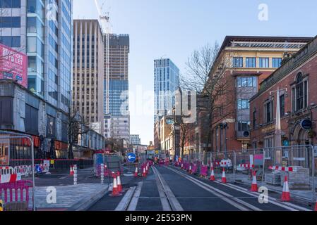 Tram lines being laid along Broad Street in Birmingham city centre Stock Photo