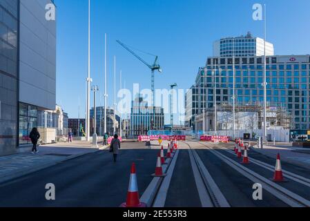 Tram lines being laid along Broad Street in Birmingham city centre Stock Photo