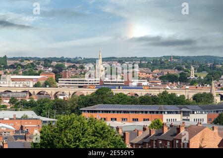 Town of Mansfield UK with St Marys John Church Pleasely Pit and Fire Station in view train crossing viaducts to centre arial view landscape sky wide Stock Photo