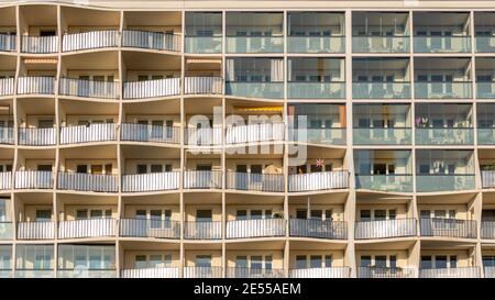 Magdeburg, Germany. 25th Jan, 2021. Curved balconies make this apartment block on Regierungsstraße in Magdeburg a sight to behold. The balconies are meant to symbolize the Elbe River. Credit: Stephan Schulz/dpa-Zentralbild/ZB/dpa/Alamy Live News Stock Photo