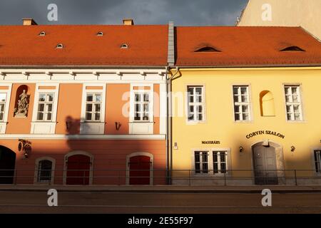 Budapest, Hungary - July 17, 2012: Evening light falls on the facades of classical buildings on Corvin Street, on the Buda side, Budapest. Stock Photo