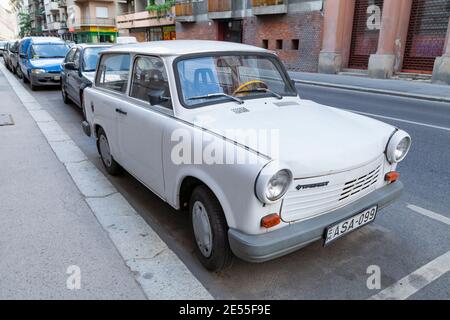 Budapest, Hungary - July 17, 2012: A classic 1960's Trabant collector's car, made in Eastern Europe, very retro and vintage, parked on a street in Bud Stock Photo