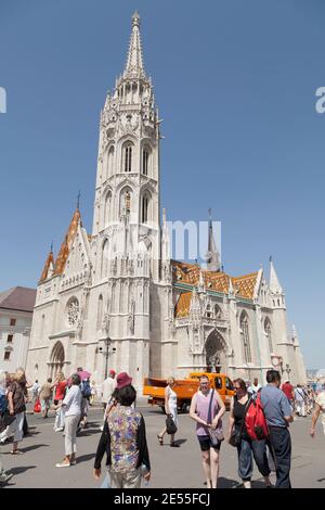 Budapest, Hungary - July 19, 2012: Famous Matthias Church or Matyas Templom, in late Gothic style, seen from Holy Trinity Square in the Castle distric Stock Photo