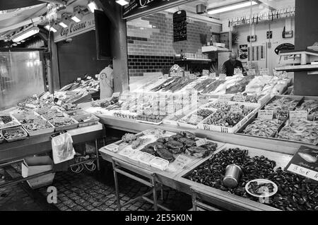 Fish  market of Trouville-sur-Mer. Trouville-sur-Mer and nearby Deauville are popular summer resorts in Normandy. Black white historic photo Stock Photo