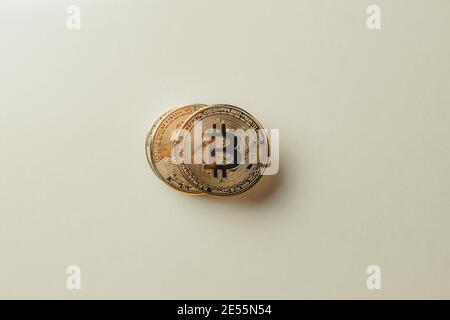 Bitcoin on a yellow background. Stock Photo