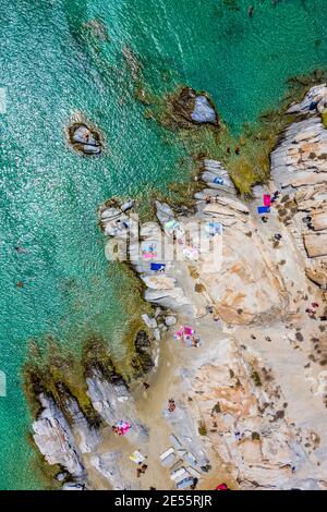 Aerial shot of a stunning rocky beach in Paros islands. Stock Photo