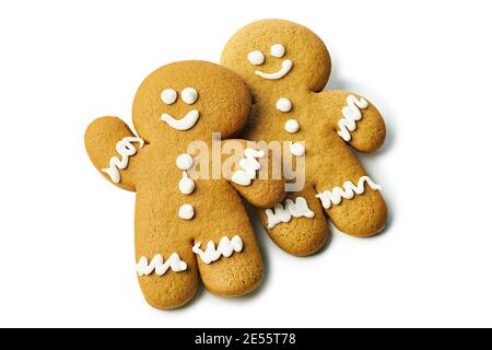 Two gingerbread cookies of man shape on white Stock Photo