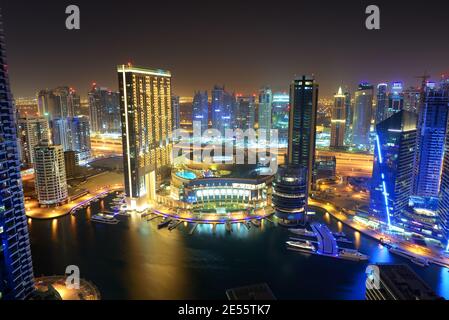 DUBAI, UAE - SEPTEMBER 8: The night illumination of Dubai Marina on September 8, 2013 in Dubai, UAE. Stock Photo