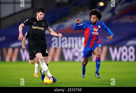 West Ham United's Declan Rice and Crystal Palace's Jairo Riedewald (right) during the Premier League match at Selhurst Park, London. Picture date: Tuesday January 26, 2021. Stock Photo