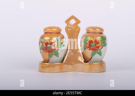 Vintage Salt and Pepper Shakers from the 70's - 80's. Ceramic brown with flower on it. Luke Durda/Alamy Stock Photo