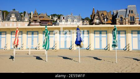 white beach hut doors sunshade wooden holiday Stock Photo - Alamy