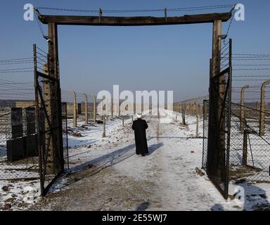 Oswiecim, Poland - February 1, 2011: The participants of the Aladin project visited the Auschwitz-Birekenau State Museum, where they paid tribute to t Stock Photo
