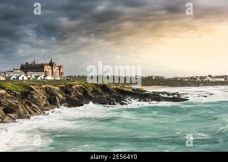 Rough sea high tide and rugged rocks at Little Fistral in Newquay in Cornwall. Stock Photo
