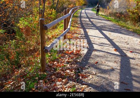 Walker enjoys Green-Way Itinerary by Banos de Montemayor on Magic Autumn season, Extremadura, Spain Stock Photo