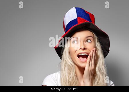 Smiling Football Fan Face. Woman Expressing Emotions of Joy. Russian Team Supporter, Girl Watching Game on Championship. Stock Photo