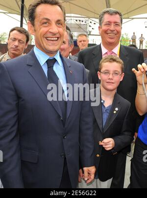 French President Nicolas Sarkozy alongside his son Louis pays a visit to French Olympic athletes ahead of the opening ceremony at the Olympic Village in Beijing, China on August 8, 2008. Photo by Gouhier-Hahn-Nebinger/ABACAPRESS.COM Stock Photo