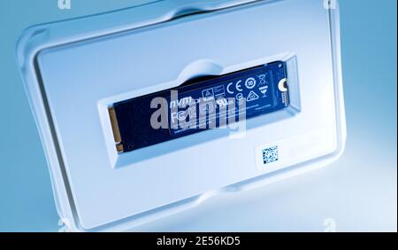 London, United Kingdom - Jan 18, 2019: new fast M2 V-Nand SSD Samsung 970 disk with one terabyte storage space in the plastic presentation box - blue color cast Stock Photo