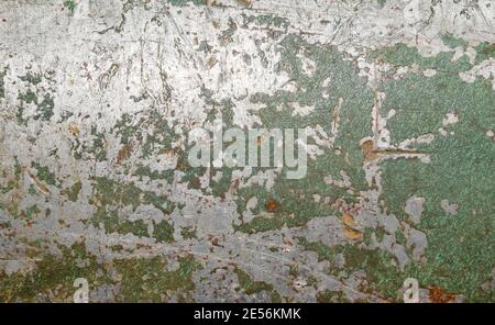 Photo of a rusty old metal texture with scratches and paint on it. Stock Photo