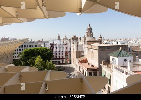 The Metropol Parasol, a large wooden structure designed by the German architect Jurgen Mayer-Hermann at La Encarnacion square. Here it frames the skyl Stock Photo