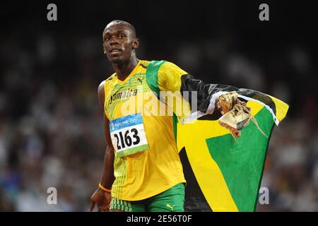 Jamaica's Usain Bolt performs in the Men's 100m Final of the XXIX Beijing Olympic Game sat the National Stadium in Beijing, China on August 16, 2008. Bolt wins the gold medal. Photo by Gouhier-Hahn-Nebinger/Cameleon/ABACAPRESS.COM Stock Photo