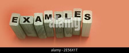 Examples word written on wooden blocks. Education or storytelling marketing concept. Stock Photo