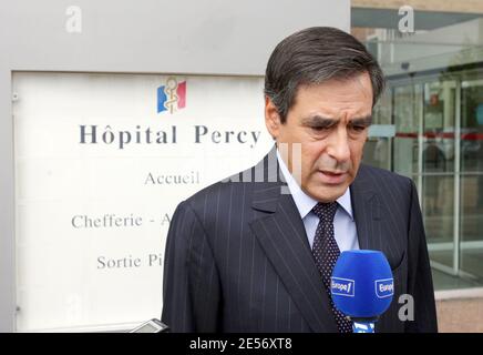 French Prime Minister Francois Fillon answers to journalists' questions on August 20, 2008 at the military Percy hospital in Clarmart, western Paris, France after he visited French soldiers hospitalized after being wounded in clashes with Taliban insurgents in Kabul in Afghanistan on August 19, 2008. 10 French soldiers were killed in the ambush whereas 21 were wounded and rapatriated by plane earlier in the day. About 70,000 international troops -- 40,000 of them with a NATO-led force -- are fighting alongside Afghan security forces against Taliban militants whose regime was ousted in a US-led Stock Photo