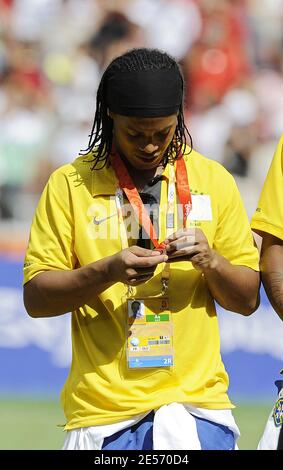 Ronaldinho of Brazil talks with someone on his cell during the medal ceremony after the Men's Gold Medal football match between Nigeria and Argentina of Beijing 2008 Olympic Games on Day 15 at the National Stadium in Beijing, China on August 23, 2008. Argentina won 1-0. Photo by Gouhier-Hahn/Cameeon/ABACAPRESS.COM Stock Photo