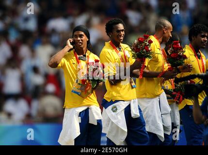 Ronaldinho of Brazil talks with someone on his cell during the medal ceremony after the Men's Gold Medal football match between Nigeria and Argentina of Beijing 2008 Olympic Games on Day 15 at the National Stadium in Beijing, China on August 23, 2008. Argentina won 1-0. Photo by Gouhier-Hahn/Cameeon/ABACAPRESS.COM Stock Photo
