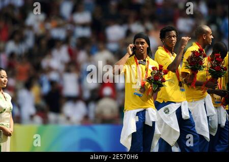 Ronaldinho of Brazil talks with someone on his cell during the medal ceremony after the Men's Gold Medal football match between Nigeria and Argentina of Beijing 2008 Olympic Games on Day 15 at the National Stadium in Beijing, China on August 23, 2008. Argentina won 1-0. Photo by Gouhier-Hahn/Cameeon/ABACAPRESS.COM Stock Photo