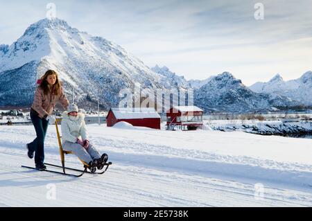 Kicksled on the roads of Vesterålen in Northern Norway in a magnificent ...