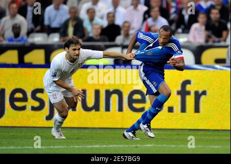 France's Thierr y Henry and Serbia's Branislav Ivanovic during the Soccer match, World Cup 2010 Qualifying, France vs Serbia at the stade de France in Saint-Denis near Paris, France on September 10, 2008. France won 2-1. Photo by Stephane Reix/ABACAPRESS.COM Stock Photo