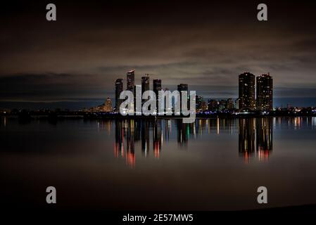 Etobicoke lakeshore skyline across Lake Ontario featuring many condominium towers Stock Photo