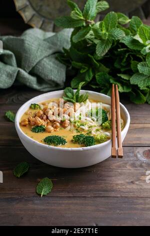 Laksa noodle soup With pumpkin and broccoli, thai spicy soup Stock Photo
