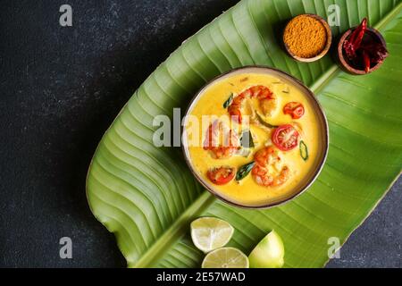 Prawn moilee, delicious south Indian curry shrimp soup with lime Stock Photo