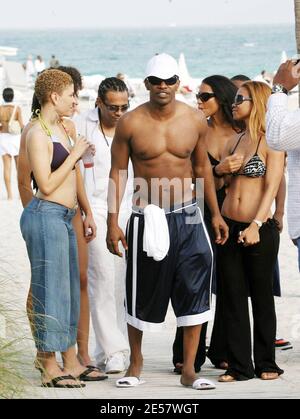 Exclusive!! Oscar Winning Party Animal actor Jamie Foxx chills at the beach with plenty of female attention the day after his sold out concert at the Bank Atlantic Center in Ft Lauderdale, FL, 2/3/07    [[tag ral]] Stock Photo