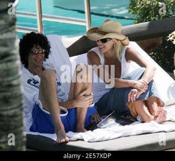 Exclusive!! Newly engaged Howard Stern and fiancee Beth Ostrosky relax at a Miami Beach hotel, 2/23/07.    [[tag mab]] Stock Photo