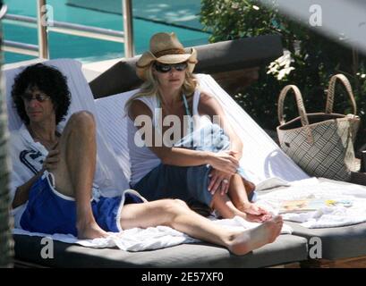 Exclusive!! Newly engaged Howard Stern and fiancee Beth Ostrosky relax at a Miami Beach hotel, 2/23/07.    [[tag mab]] Stock Photo